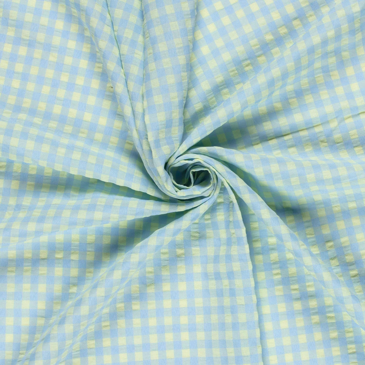 Checkered fabric with light blue and yellow pattern