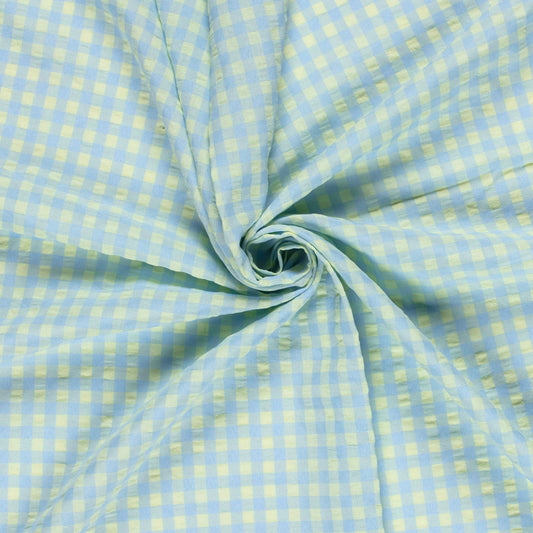 Checkered fabric with light blue and yellow pattern