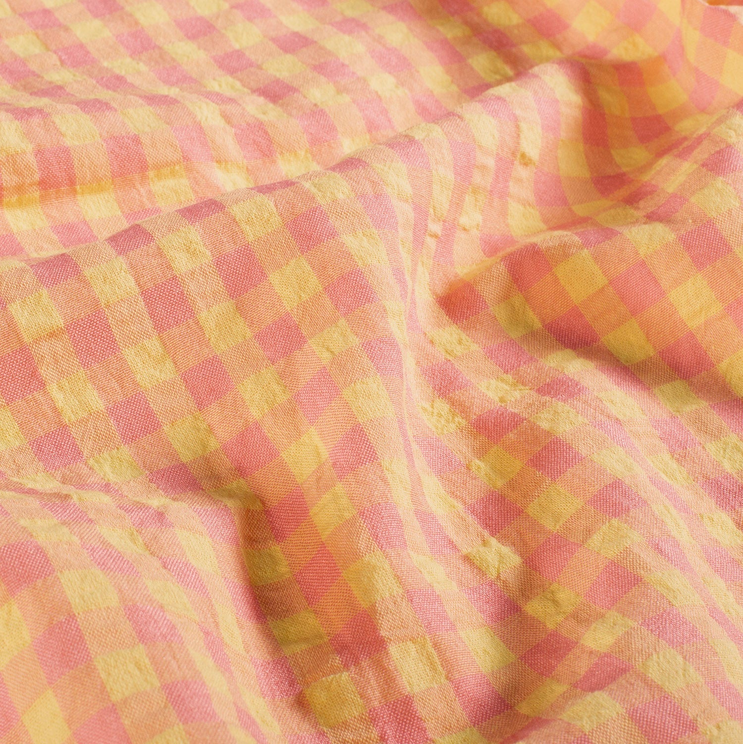 Pink and yellow checkered fabric