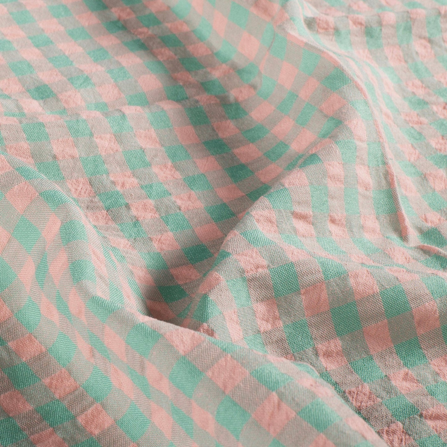 Close-up of pink and green checkered fabric