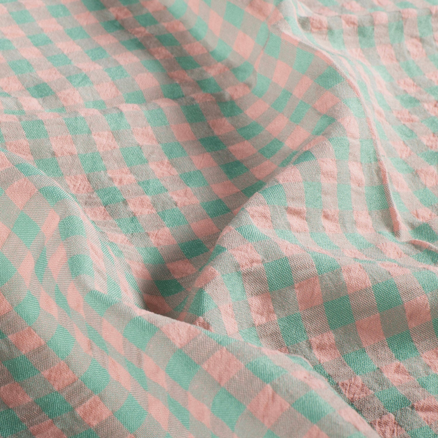 Close-up of pink and green checkered fabric