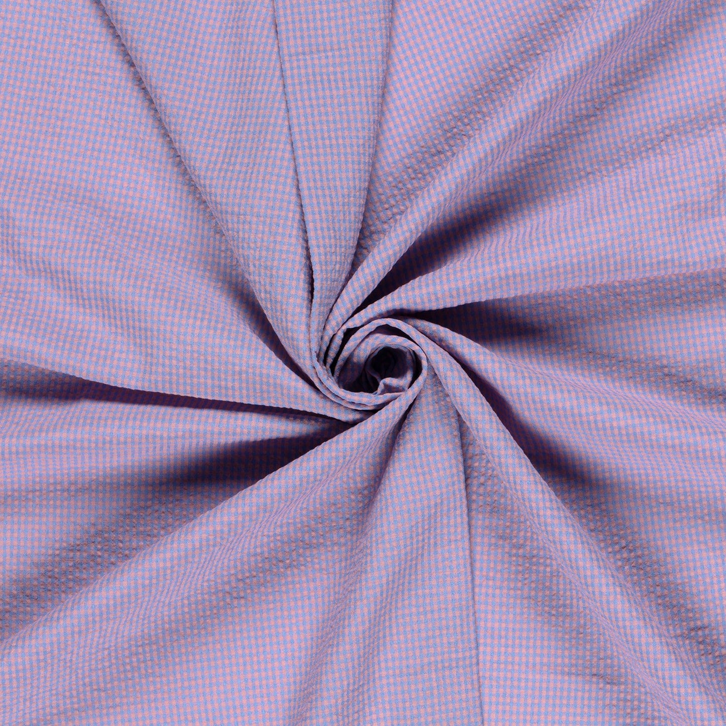 Close-up of pink and blue gingham checkered cotton fabric 