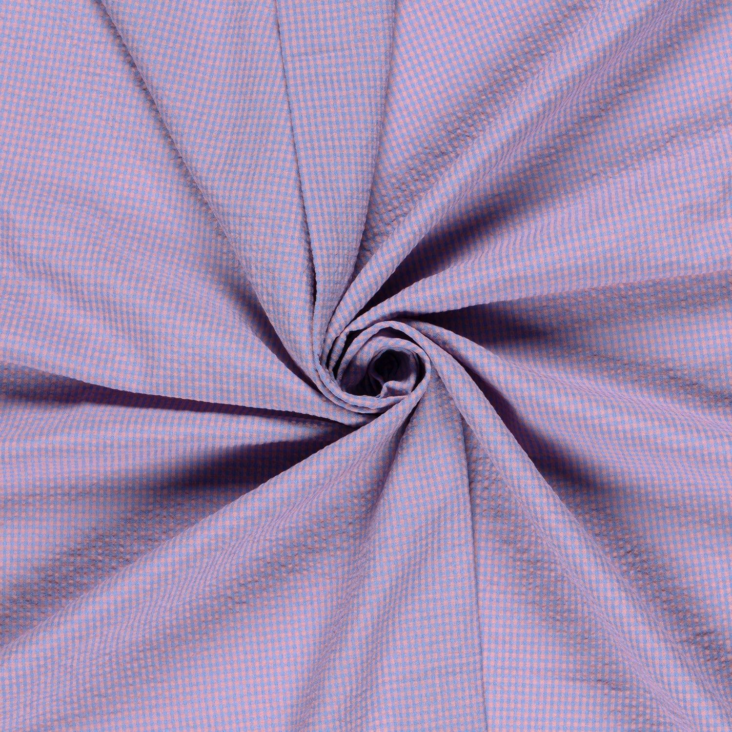 Close-up of pink and blue gingham checkered cotton fabric 