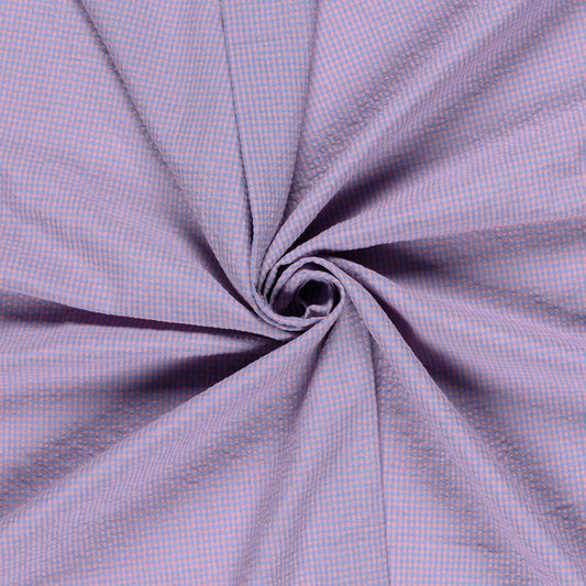 Close-up of pink and blue gingham checkered cotton fabric 