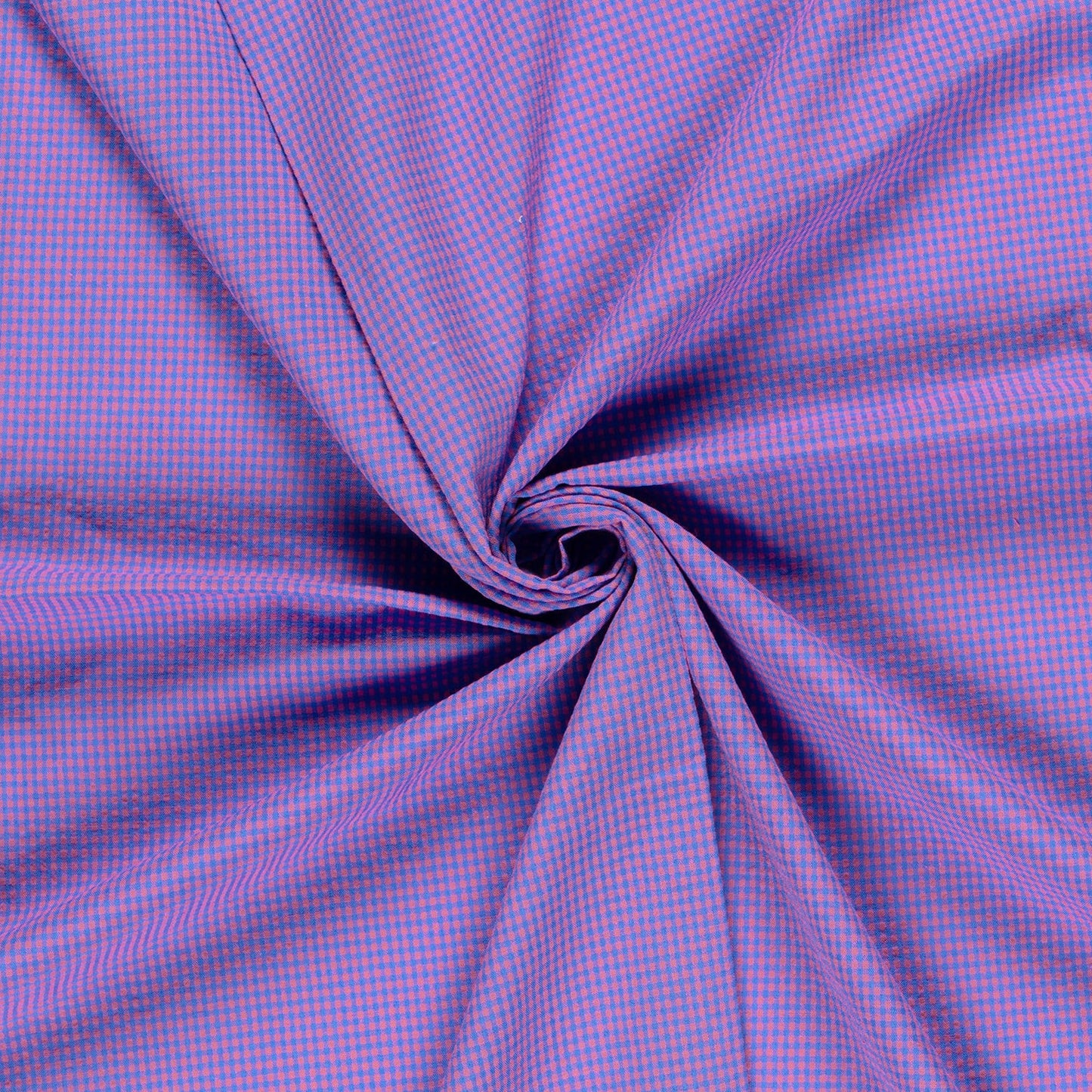 A close-up of purple and pink micro-checkered fabric, styled with a central swirl to show its drape and texture.