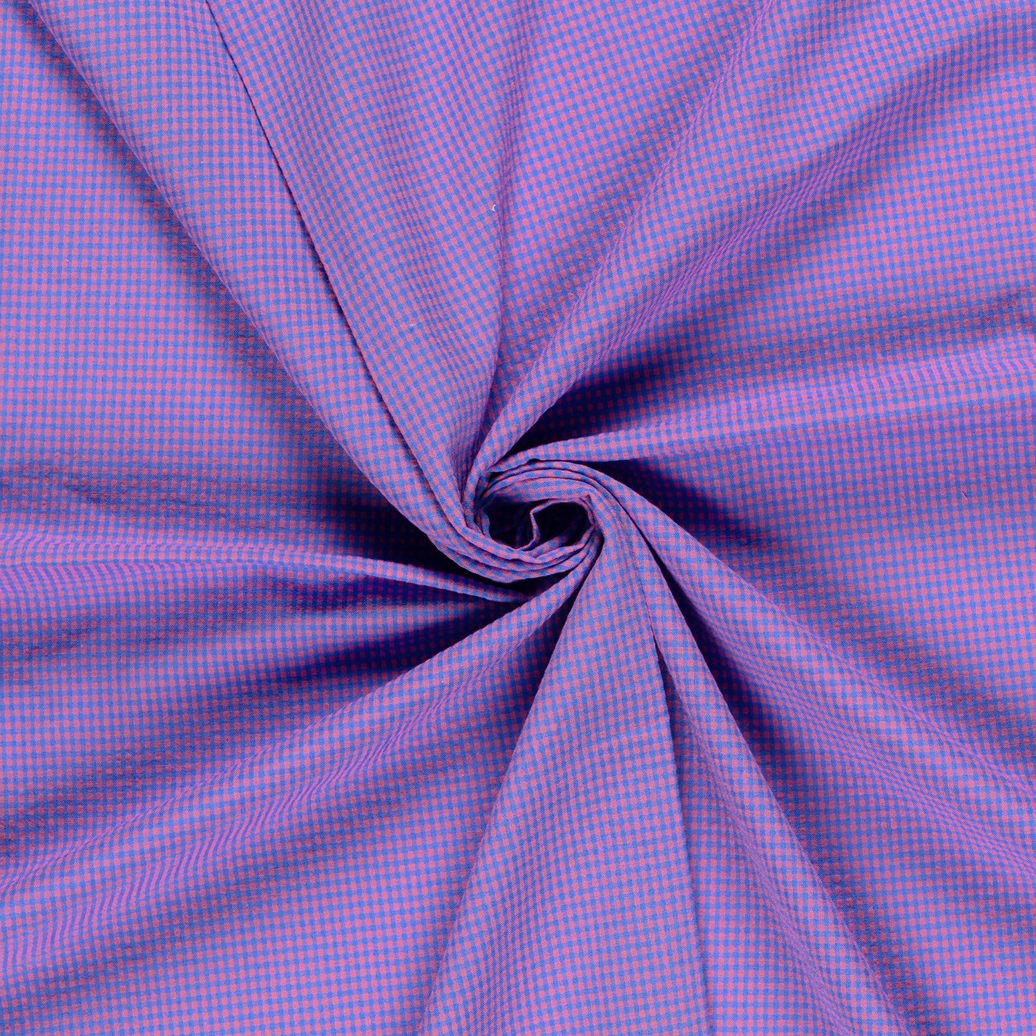 A close-up of purple and pink micro-checkered fabric, styled with a central swirl to show its drape and texture.