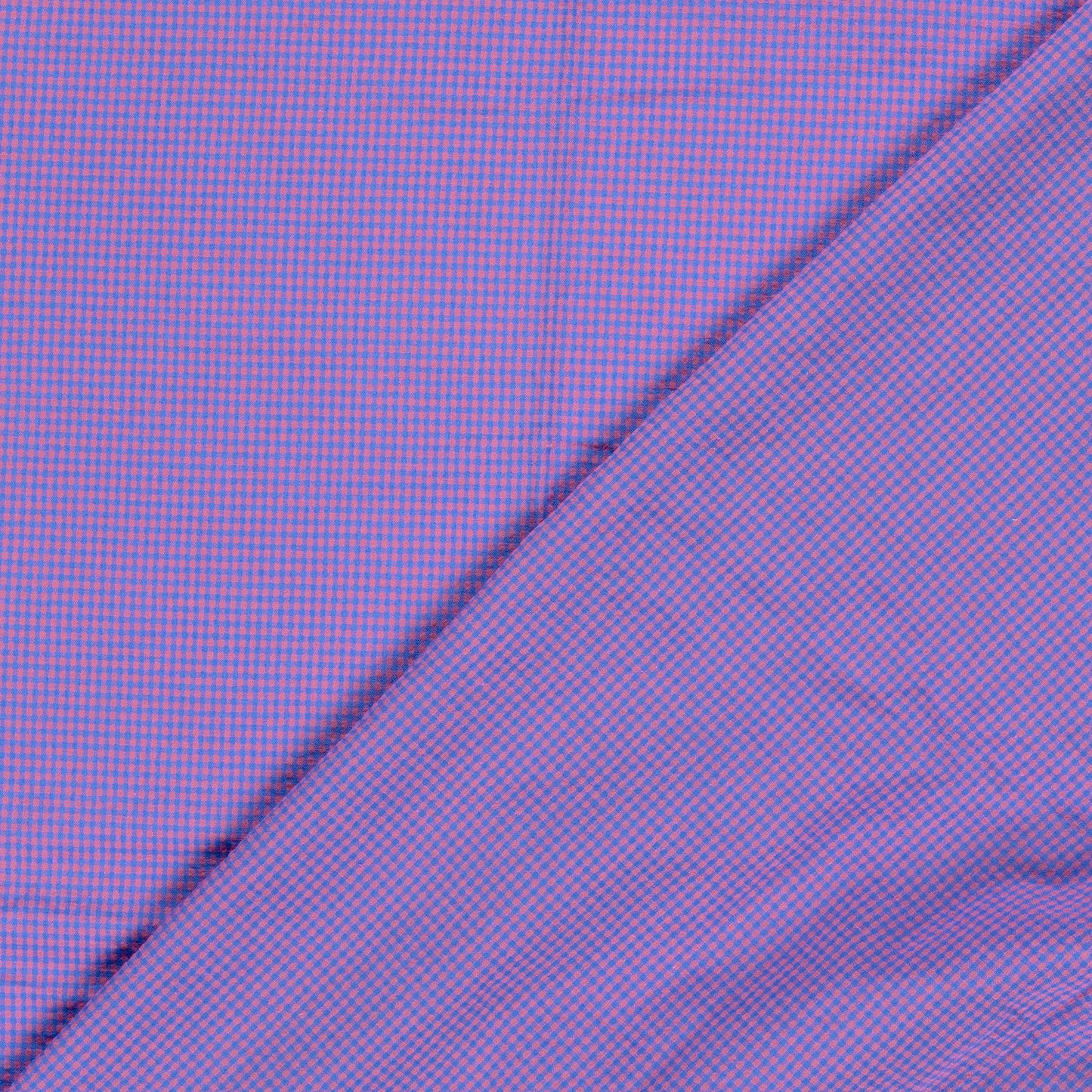 A close-up of a purple and blue micro-checkered fabric, folded diagonally across the frame.