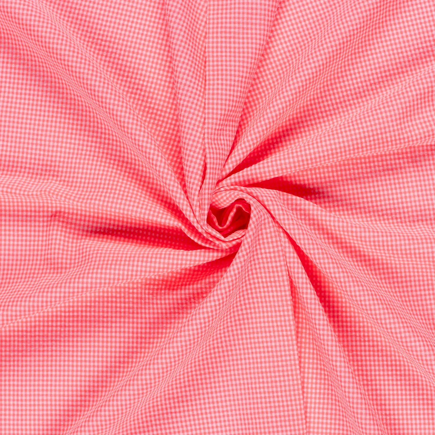 A close-up of pink and white gingham fabric arranged in a spiral swirl, showing the texture and pattern of the material.