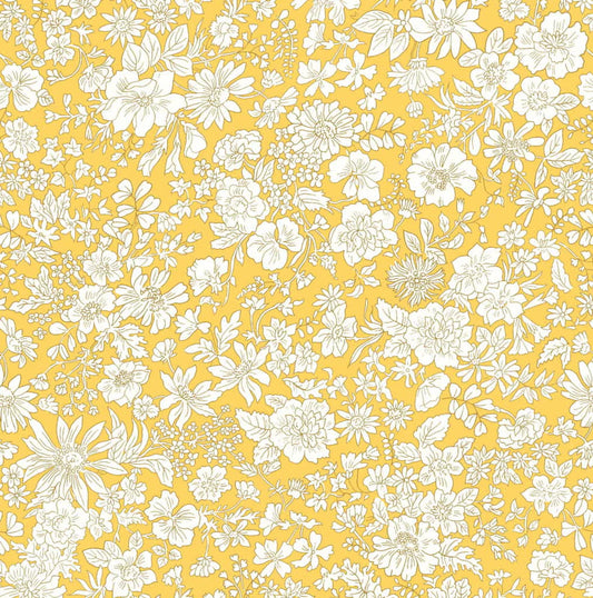 Ivory floral pattern on a bright yellow quilting cotton