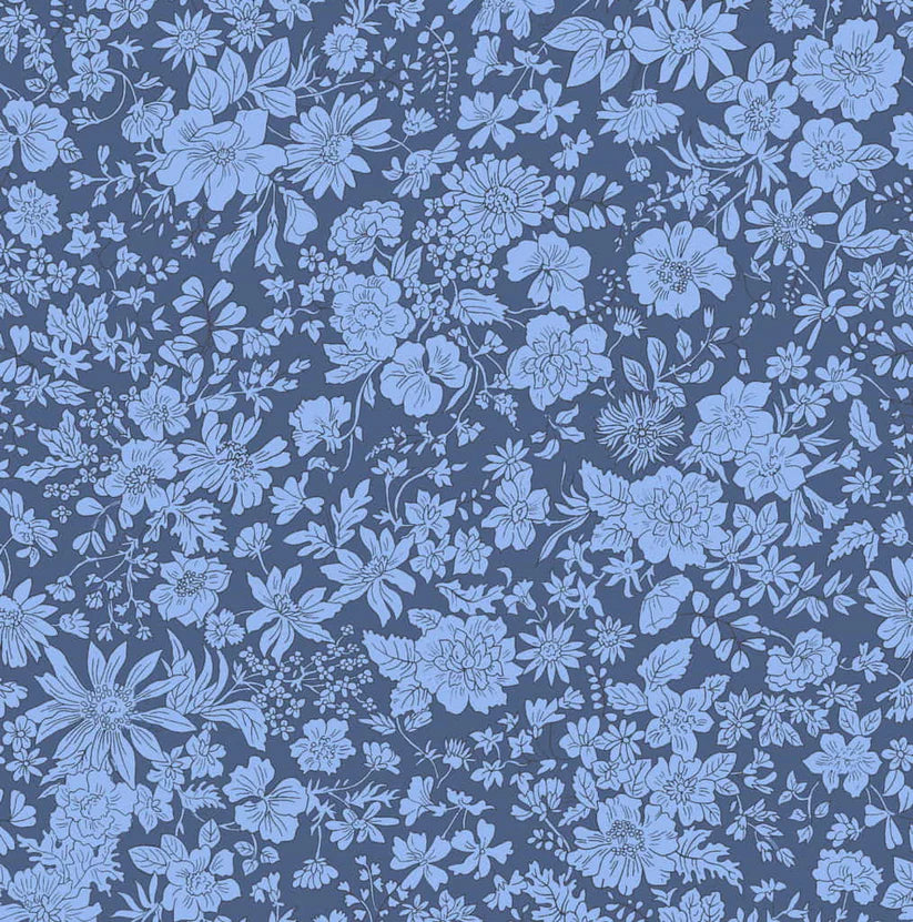 Floral pattern with blue flowers on a dark blue quilting cotton