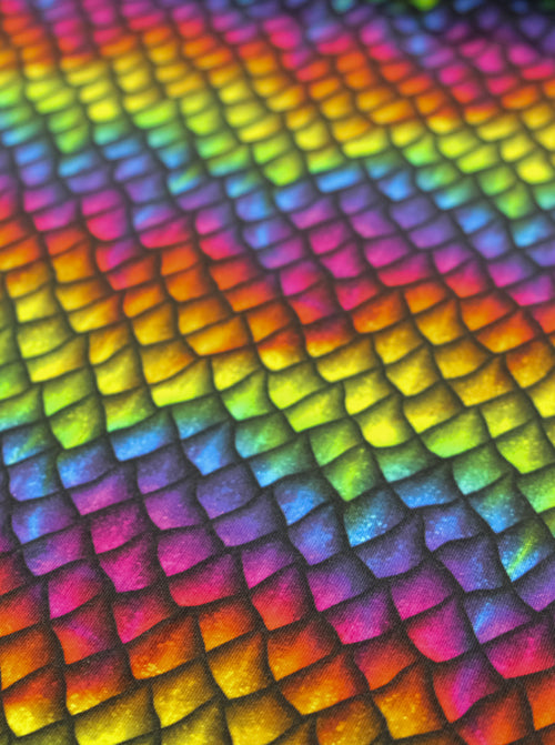 Close-up of a colorful, textured pattern resembling dragon scales.