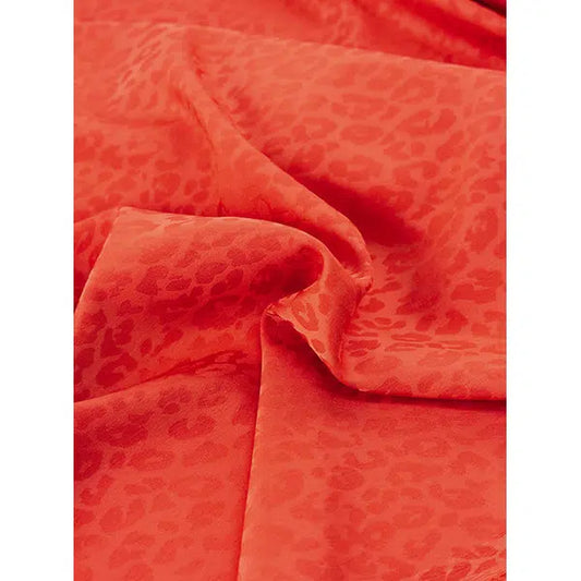 Leopard Jacquard Satin Fabric - Habanero | Truro Fabrics