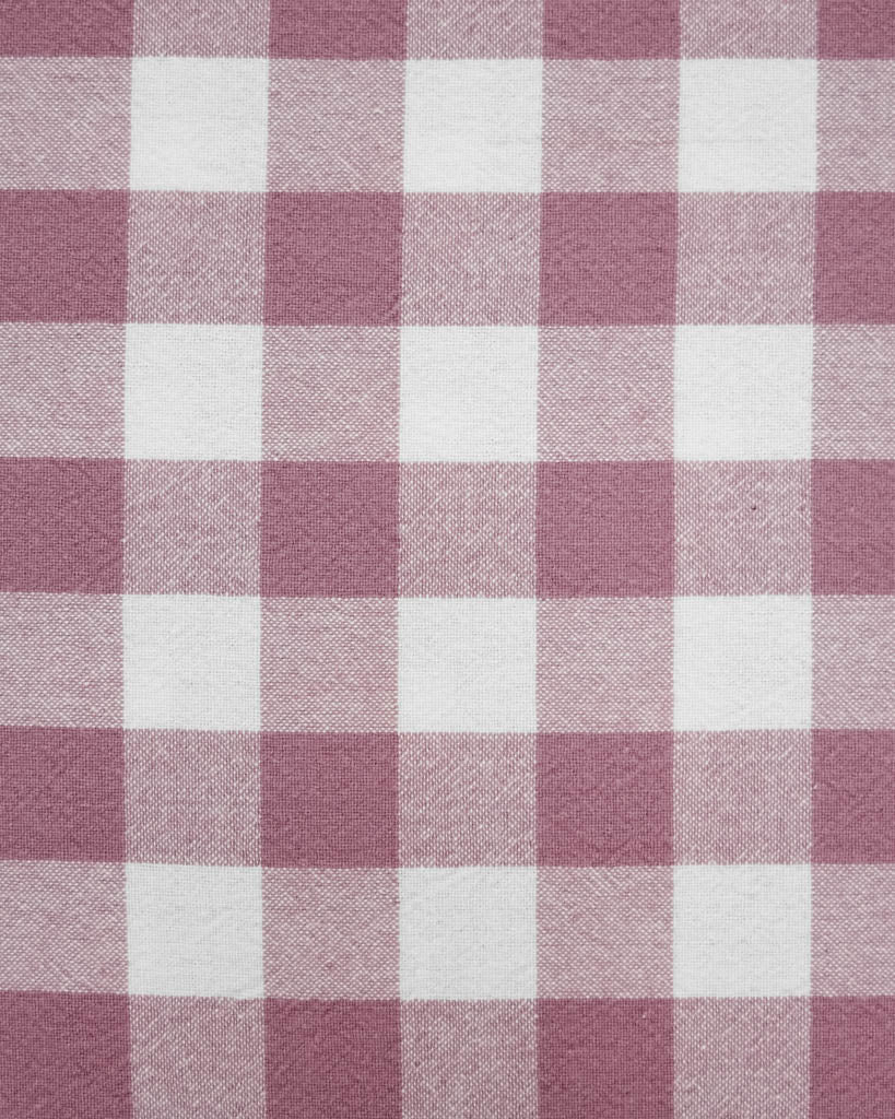 Close-up of a purple and white checkered fabric pattern
