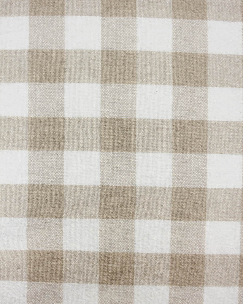 Checkered fabric pattern with brown and white squares