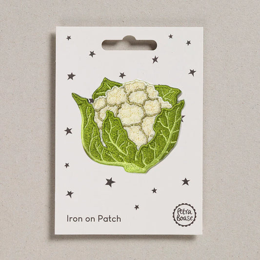 Petra Boase cauliflower iron-on embroidered patch with cream cauliflower and green leaves on presentation card.