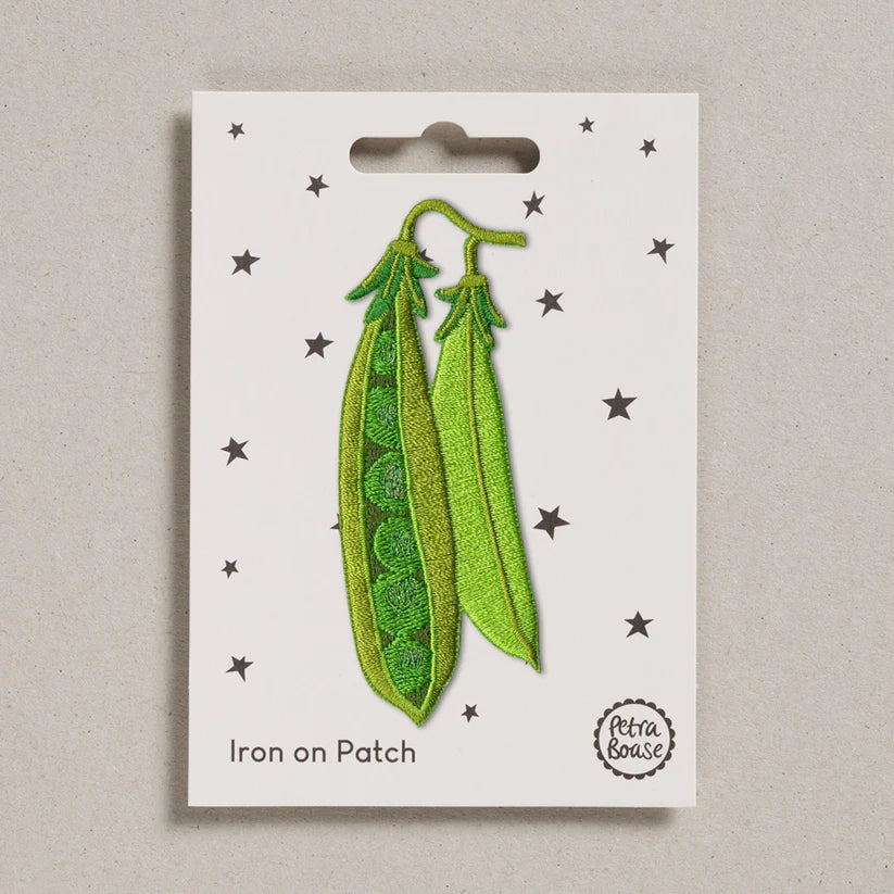 Petra Boase peapod iron-on embroidered patch featuring a green pea pod design on presentation card.