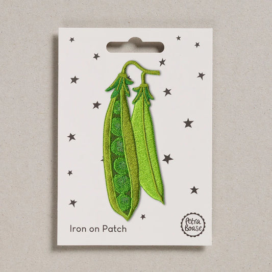 Petra Boase peapod iron-on embroidered patch featuring a green pea pod design on presentation card.