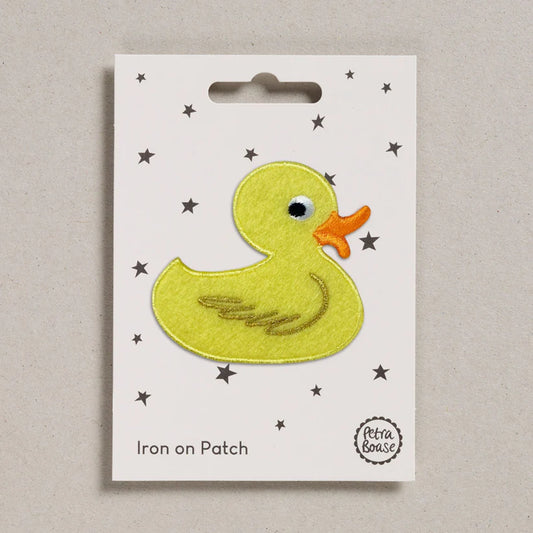 Petra Boase rubber duck iron-on embroidered patch featuring a bright yellow duck design on presentation card