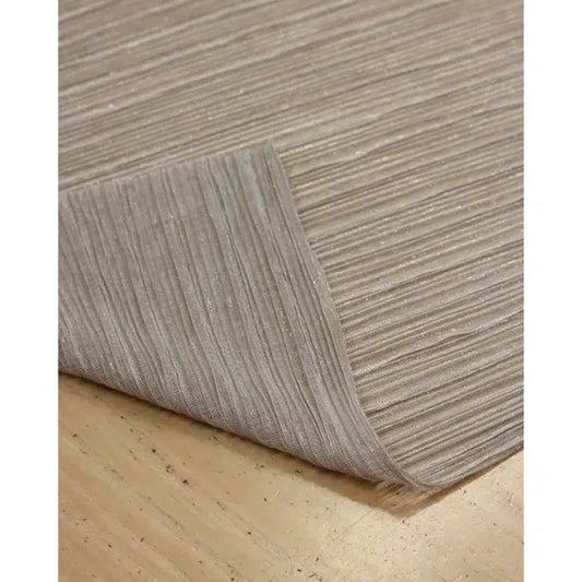 REMNANT Champagne Gold Sparkle Plissé Jersey - 230cm x 150cm – view 2 | Truro Fabrics