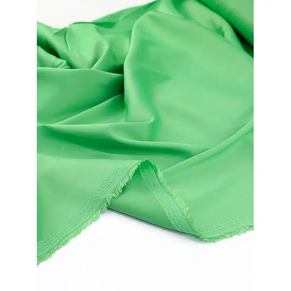 Stretch Rayon Satin Fabric - Kiwi Twist – view 2 | Truro Fabrics