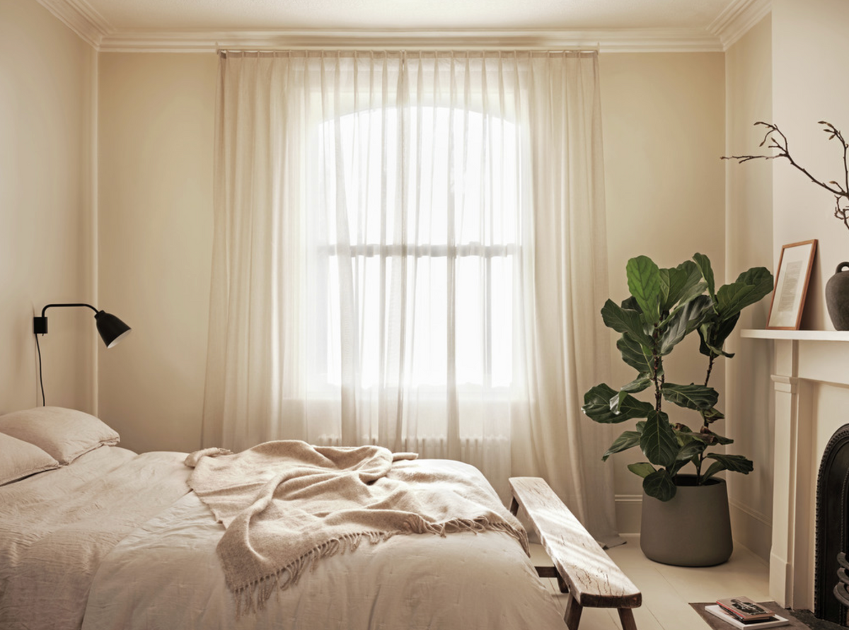 Curtain track fitted across a bedroom window