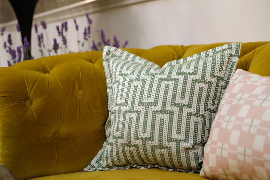 Made-to-measure cushions on a mustard sofa