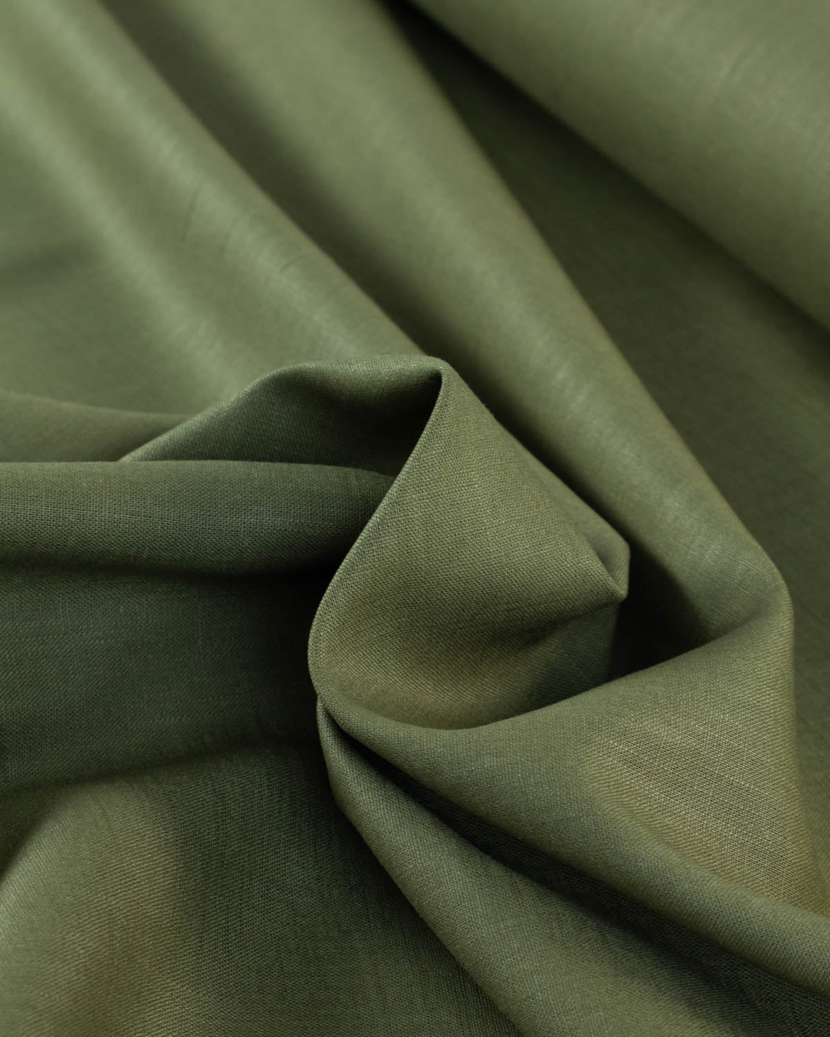 Close up of olive green linen fabric