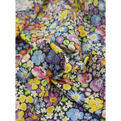 Close-up image of Barcelona Cotton Fabric - Pansy Parade. Spring Floral fabric in multi colours
